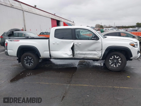2021 Toyota Tacoma 4WD SR5 with VIN 3TMDZ5BN6MM108851, listed as a IAAI auction lot 41513057 with 25,261 mi miles. Bid and sale history available at carsss.com. Image 13.
