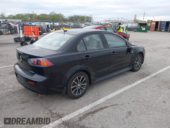 2015 Mitsubishi Lancer SE with VIN JA32V2FW2FU002303, listed as a IAAI auction lot 41927592 with 32,444 mi miles. Bid and sale history available at carsss.com. Image 4.