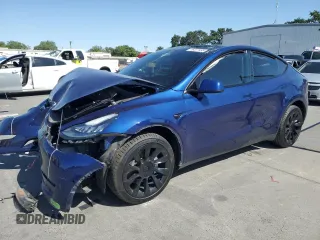 2022 Tesla Model Y Long Range z VIN 7SAYGDEE6NF572647, wystawiony jako Copart lot #58337495 z przebiegiem Nie podano mil oraz Szkoda całkowita • Salvage title. Historia ofert i sprzedaży dostępna na DreamBid. Obrazek 1.