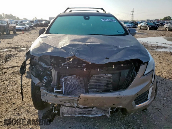 2022 Cadillac XT5 Premium Luxury FWD z VIN 1GYKNERS9NZ120517, wystawiony jako Copart lot #58978045 z przebiegiem 31 456 mil mil oraz Szkoda całkowita • Salvage title. Historia ofert i sprzedaży dostępna na DreamBid. Obrazek 5.