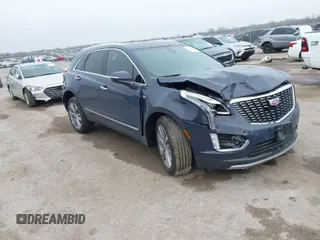 2024 Cadillac XT5 FWD Premium Luxury with VIN 1GYKNCR47RZ755652, listed as a IAAI auction lot 41512069 with 10,243 mi miles. Bid and sale history available at carsss.com. Image 1.