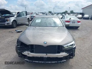2018 BMW 5 Series 530i xDrive with VIN WBAJA7C55JG909519, listed as a IAAI auction lot 42650263 with 57,077 mi miles and . Bid and sale history available at DreamBid. Image 12.