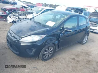 2013 Ford Fiesta SE with VIN 3FADP4EJ7DM140755, listed as a IAAI auction lot 41908366 with 68,744 mi miles. Bid and sale history available at carsss.com. Image 2.