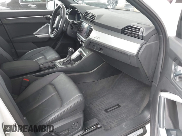 2021 Audi Q3 S line Premium z VIN WA1DECF31M1074155, wystawiony jako IAAI lot #42381678 z przebiegiem 36 894 mil mil oraz . Historia ofert i sprzedaży dostępna na DreamBid. Obrazek 5.