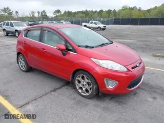 2011 Ford Fiesta SES with VIN 3FADP4FJ3BM204673, listed as a IAAI auction lot 41891902 with 145,967 mi miles. Bid and sale history available at carsss.com. Image 1.