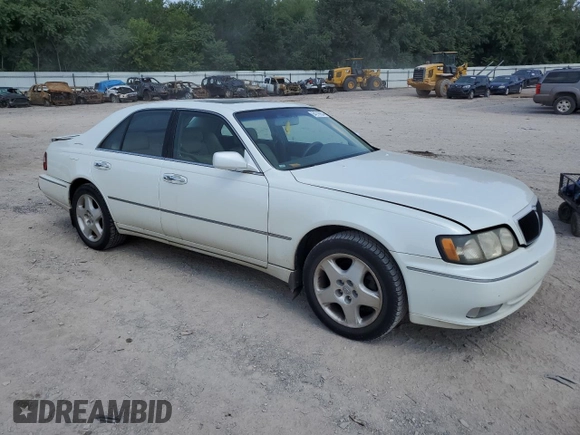 1999 Infiniti Q45 z VIN JNKBY31A2XM603477, wystawiony jako Copart lot #64216924 z przebiegiem 278 602 mil mil oraz Szkody całkowita. Historia ofert i sprzedaży dostępna na DreamBid. Obrazek 4.