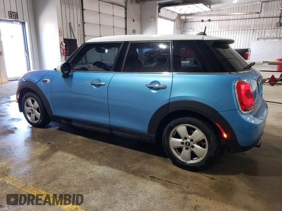 2017 MINI Hardtop 4 Door Cooper with VIN WMWXU1C58H2E17768, listed as a Copart auction lot 55128445 with 114,957 mi miles and Salvage Title. Bid and sale history available at DreamBid. Image 2.