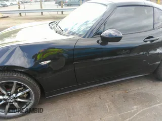 2021 Mazda MX-5 Miata Grand Touring z VIN JM1NDAM75M0451597, wystawiony jako IAAI lot #41932712 z przebiegiem 61 710 mil mil oraz . Historia ofert i sprzedaży dostępna na DreamBid. Obrazek 17.