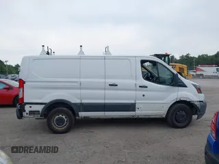 2016 Ford Transit Cargo with VIN 1FTYR1ZM3GKB39994, listed as a IAAI auction lot 42463512 with 108,813 mi miles and . Bid and sale history available at DreamBid. Image 13.