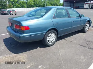 2001 Toyota Camry CE with VIN 4T1BG22K71U813310, listed as a IAAI auction lot 42559061 with 106,838 mi miles and . Bid and sale history available at DreamBid. Image 4.