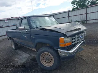 1992 Ford Ranger XLT z VIN 1FTCR15X1NTA16647, wystawiony jako IAAI lot #42385370 z przebiegiem 60 176 mil mil oraz . Historia ofert i sprzedaży dostępna na DreamBid. Obrazek 1.