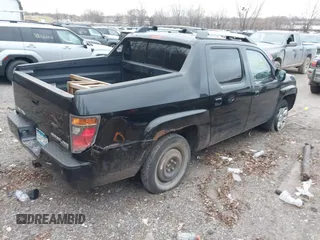 2007 Honda Ridgeline RTL z VIN 2HJYK16527H510681, wystawiony jako IAAI lot #40920924 z przebiegiem Nie podano mil oraz . Historia ofert i sprzedaży dostępna na DreamBid. Obrazek 4.