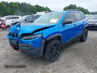 2019 Jeep Cherokee Trailhawk with VIN 1C4PJMBX0KD141577, listed as a IAAI auction lot 42413454 with 122,386 mi miles and . Bid and sale history available at DreamBid. Image 17.