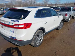 2016 Lincoln MKX Reserve with VIN 2LMTJ8LR4GBL44989, listed as a IAAI auction lot 41684823 with 101,528 mi miles. Bid and sale history available at carsss.com. Image 4.
