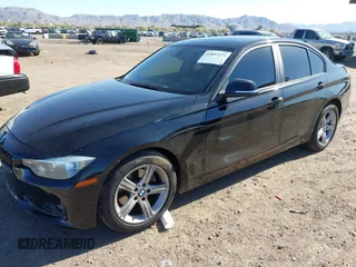 2012 BMW 3 Series 328i with VIN WBA3A5C58CF343636, listed as a IAAI auction lot 41832374 with 136,968 mi miles. Bid and sale history available at carsss.com. Image 2.