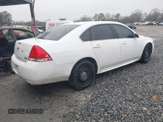 2013 Chevrolet Impala Police with VIN 2G1WD5E33D1210058, listed as a IAAI auction lot 41574143 with 156,643 mi miles. Bid and sale history available at carsss.com. Image 4.