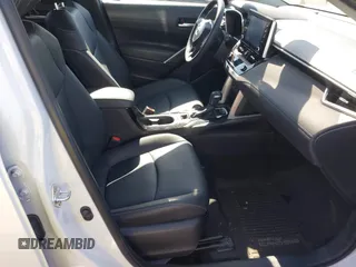 2022 Toyota Corolla Cross XLE with VIN 7MUEAAAG4NV027314, listed as a IAAI auction lot 42701907 with 30,275 mi miles and . Bid and sale history available at DreamBid. Image 5.