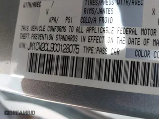 2012 Mazda Mazda5 Touring with VIN JM1CW2CL9C0128075, listed as a IAAI auction lot 41886362 with 139,262 mi miles. Bid and sale history available at carsss.com. Image 9.
