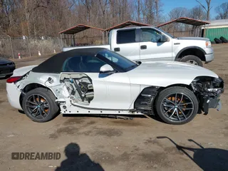 2020 BMW Z4 sDrive30i z VIN WBAHF3C09LWW54993, wystawiony jako IAAI lot #41757841 z przebiegiem Nie podano mil oraz . Historia ofert i sprzedaży dostępna na DreamBid. Obrazek 13.