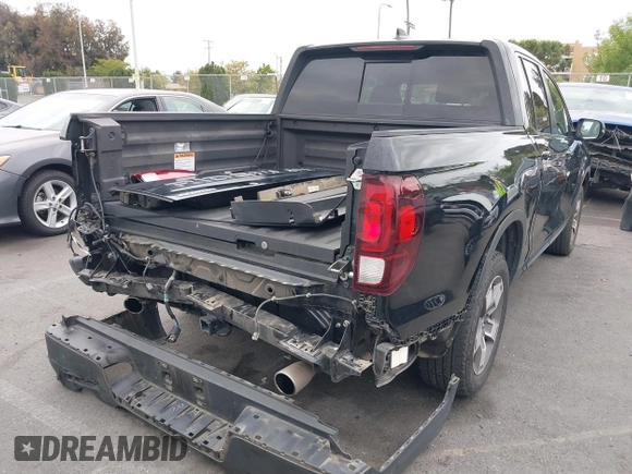 2024 Honda Ridgeline RTL with VIN 5FPYK3F56RB004027, listed as a IAAI auction lot 42049778 with 35,631 mi miles and . Bid and sale history available at DreamBid. Image 17.