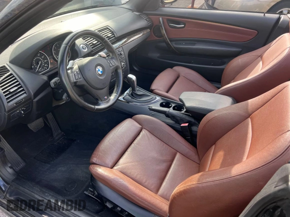 2010 BMW 1 Series 135i with VIN WBAUN9C51AVK41985, listed as a Copart auction lot 85383524 with 111,260 mi miles and Clean Title. Bid and sale history available at carsss.com. Image 9.
