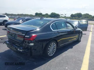 2022 BMW 7 Series 740i with VIN WBA7T2C02NCH73426, listed as a IAAI auction lot 42641007 with 49,300 mi miles and . Bid and sale history available at DreamBid. Image 4.