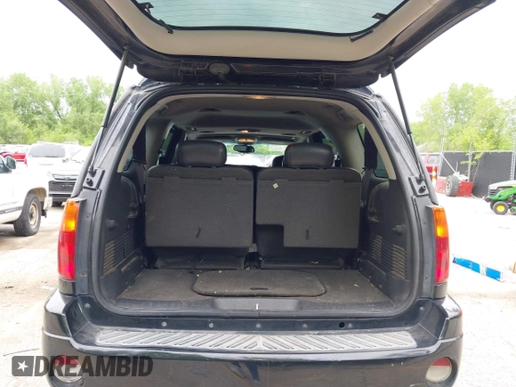 2005 GMC Envoy XL SLE with VIN 1GKET16S156114805, listed as a IAAI auction lot 42163519 with 168,584 mi miles. Bid and sale history available at carsss.com. Image 12.