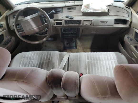 1992 Mercury Sable GS z VIN 1MELM50U7NA643480, wystawiony jako Copart lot #84833624 z przebiegiem 19 580 mil mil oraz Szkody całkowita. Historia ofert i sprzedaży dostępna na DreamBid. Obrazek 8.