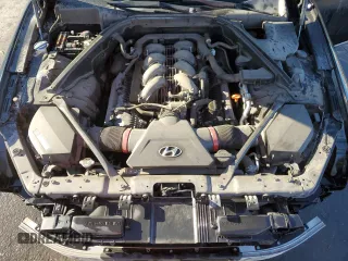 2015 Hyundai Genesis 5.0L with VIN KMHGN4JF2FU036120, listed as a Copart auction lot 63037604 with 102,936 mi miles and Salvage Title. Bid and sale history available at carsss.com. Image 11.
