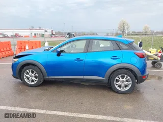 2016 Mazda CX-3 Touring with VIN JM1DKBC77G0112529, listed as a IAAI auction lot 41852258 with 134,412 mi miles. Bid and sale history available at carsss.com. Image 14.