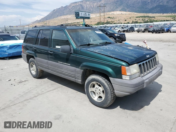 1996 Jeep Grand Cherokee Laredo z VIN 1J4GZ58S8TC222435, wystawiony jako Copart lot #62347665 z przebiegiem 202 125 mil mil oraz Czysty tytuł • Clean title. Historia ofert i sprzedaży dostępna na DreamBid. Obrazek 4.