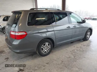 2007 Honda Odyssey EX with VIN 5FNRL38417B054717, listed as a IAAI auction lot 41955733 with 157,076 mi miles. Bid and sale history available at carsss.com. Image 4.
