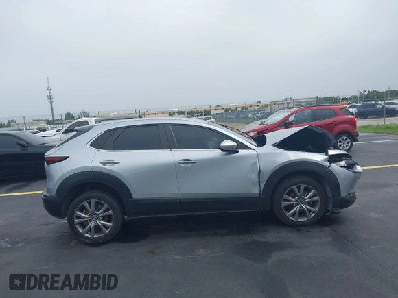 2021 Mazda CX-30 Select with VIN 3MVDMBBLXMM246600, listed as a IAAI auction lot 42418629 with 77,713 mi miles and . Bid and sale history available at DreamBid. Image 12.