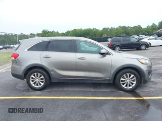 2016 Kia Sorento LX with VIN 5XYPGDA51GG012335, listed as a IAAI auction lot 42224249 with 166,752 mi miles and . Bid and sale history available at DreamBid. Image 13.