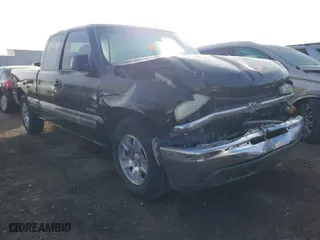 1999 Chevrolet Silverado 1500 LS with VIN 2GCEC19T4X1165256, listed as a IAAI auction lot 41236272 with 77,004 mi miles. Bid and sale history available at carsss.com. Image 1.