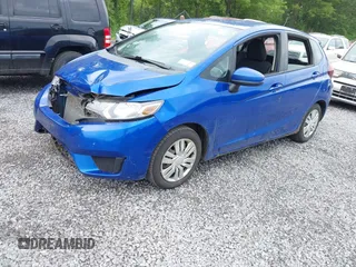 2015 Honda Fit LX with VIN 3HGGK5G59FM711808, listed as a IAAI auction lot 42655848 with 169,780 mi miles and . Bid and sale history available at DreamBid. Image 2.