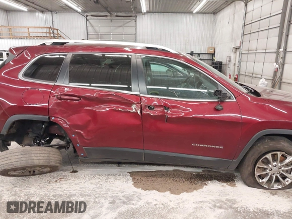 2019 Jeep Cherokee Latitude Plus with VIN 1C4PJMLX0KD185576, listed as a IAAI auction lot 40929611 with 105,546 mi miles and . Bid and sale history available at DreamBid. Image 6.