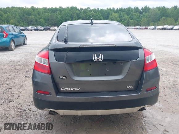 2013 Honda Crosstour EX-L z VIN 5J6TF1H56DL002352, wystawiony jako IAAI lot #42303791 z przebiegiem 178 443 mil mil oraz . Historia ofert i sprzedaży dostępna na DreamBid. Obrazek 16.