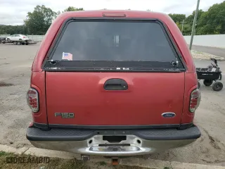 2001 Ford F-150 SuperCrew XLT with VIN 1FTRW08W01KE02928, listed as a Copart auction lot 73629704 with 313,859 mi miles and Salvage Title. Bid and sale history available at carsss.com. Image 6.