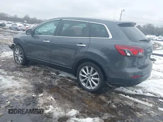 2014 Mazda CX-9 Grand Touring with VIN JM3TB3DV9E0440506, listed as a IAAI auction lot 41537718 with 217,299 mi miles and . Bid and sale history available at DreamBid. Image 3.
