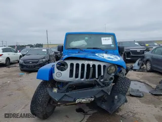 2015 Jeep Wrangler Unlimited Sport with VIN 1C4HJWDG2FL592793, listed as a IAAI auction lot 41602307 with 126,610 mi miles. Bid and sale history available at carsss.com. Image 12.