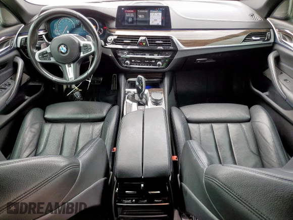 2018 BMW 5 Series 540i с VIN WBAJE5C58JG917669, выставлен на аукционе Copart как лот 57396815 с пробегом 117 967 миль миль и Списание • Salvage title. История ставок и продаж доступна на DreamBid. Изображение 8.