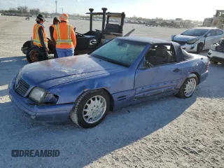 1997 Mercedes-Benz SL-Class with VIN WDBFA63F1VF152883, listed as a Copart auction lot 77570524 with 0 mi miles and Salvage Title. Bid and sale history available at carsss.com. Image 1.