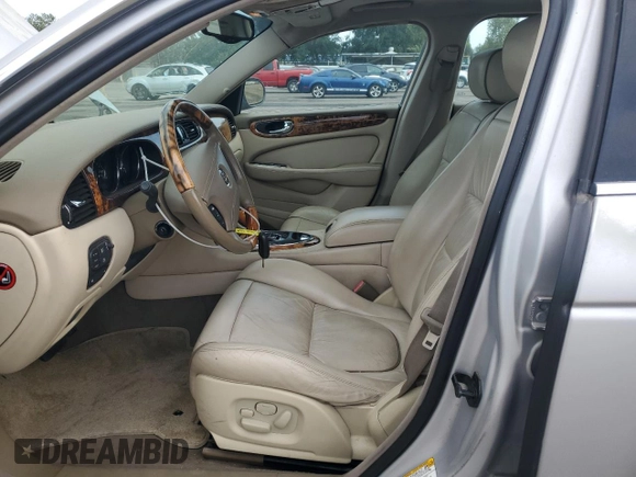 2004 Jaguar XJ Vanden Plas with VIN SAJWA74C04SG25291, listed as a Copart auction lot 56678255 with 176,597 mi miles and Clean Title. Bid and sale history available at DreamBid. Image 7.