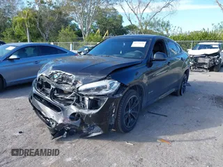 2018 BMW X6 sDrive35i with VIN 5UXKU0C5XJ0G80724, listed as a IAAI auction lot 41274338 with 122,696 mi miles. Bid and sale history available at carsss.com. Image 17.