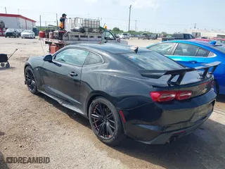 2019 Chevrolet Camaro 1LT with VIN 1G1FB1RX5K0133813, listed as a IAAI auction lot 41927669 with 89,557 mi miles. Bid and sale history available at carsss.com. Image 3.