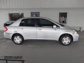 2011 Nissan Versa S with VIN 3N1BC1APXBL460003, listed as a IAAI auction lot 42206242 with 113,099 mi miles and . Bid and sale history available at DreamBid. Image 13.