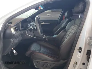 2022 Genesis G70 3.3T with VIN KMTG54TE6NU097060, listed as a Copart auction lot 61987105 with 21,878 mi miles and Salvage title. Bid and sale history available at DreamBid. Image 7.