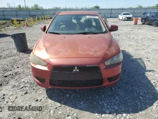 2008 Mitsubishi Lancer DE with VIN JA3AU26U88U031546, listed as a Copart auction lot 52340095 with 212,896 mi miles and Salvage Title. Bid and sale history available at DreamBid. Image 5.