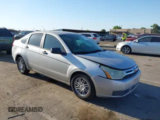 2009 Ford Focus SE z VIN 1FAHP35N79W205349, wystawiony jako IAAI lot #42392091 z przebiegiem 150 838 mil mil oraz . Historia ofert i sprzedaży dostępna na DreamBid. Obrazek 1.